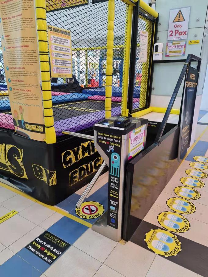 Portone automatico del cancello girevole del braccio di caduta del sistema RFID del supermercato del portone del cancello girevole del treppiede di sicurezza 0